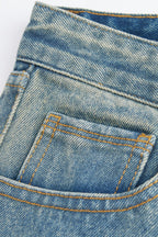 Distressed Patchwork Studded Jeans