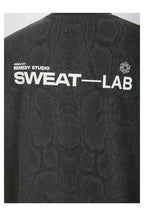 Sweat-Reactive Snakeskin Glow Tee — gallery