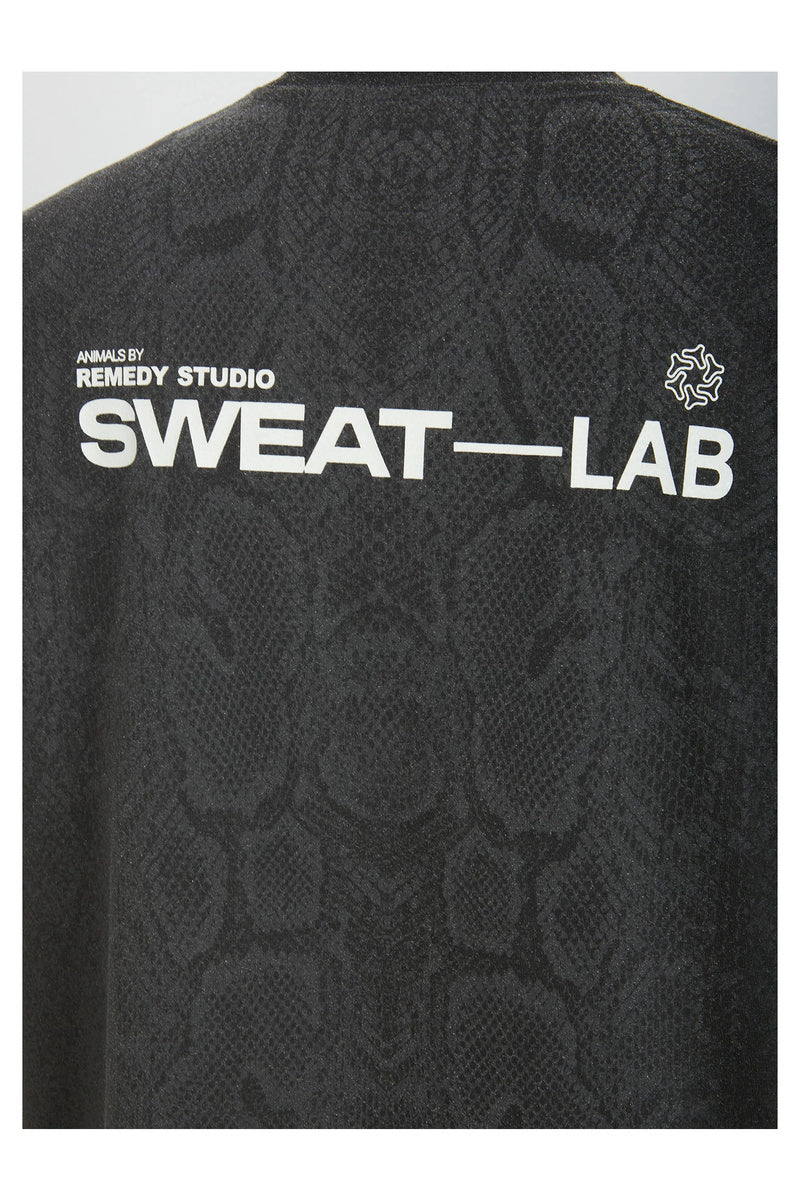 Sweat-Reactive Snakeskin Glow Tee — gallery