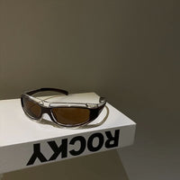 Black Frame / Brown Lens