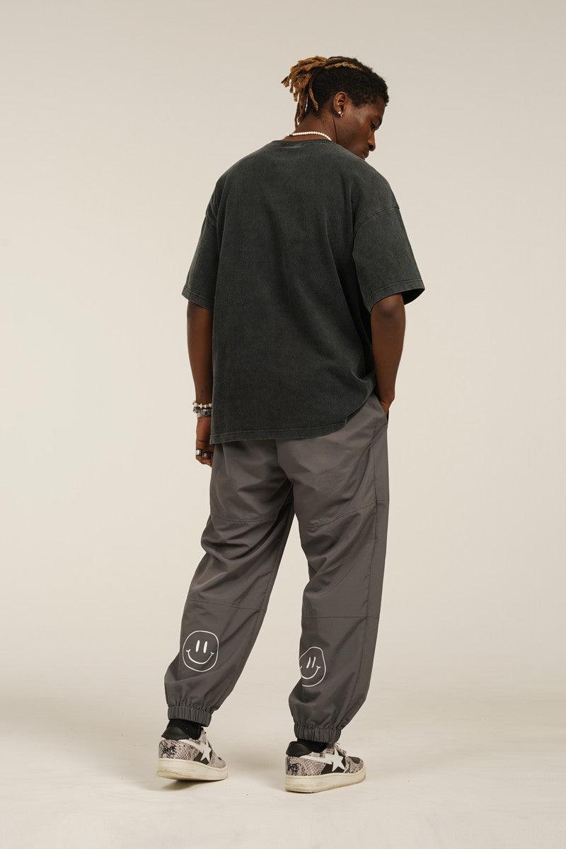 Empty Reference Smiley Logo Casual Pants